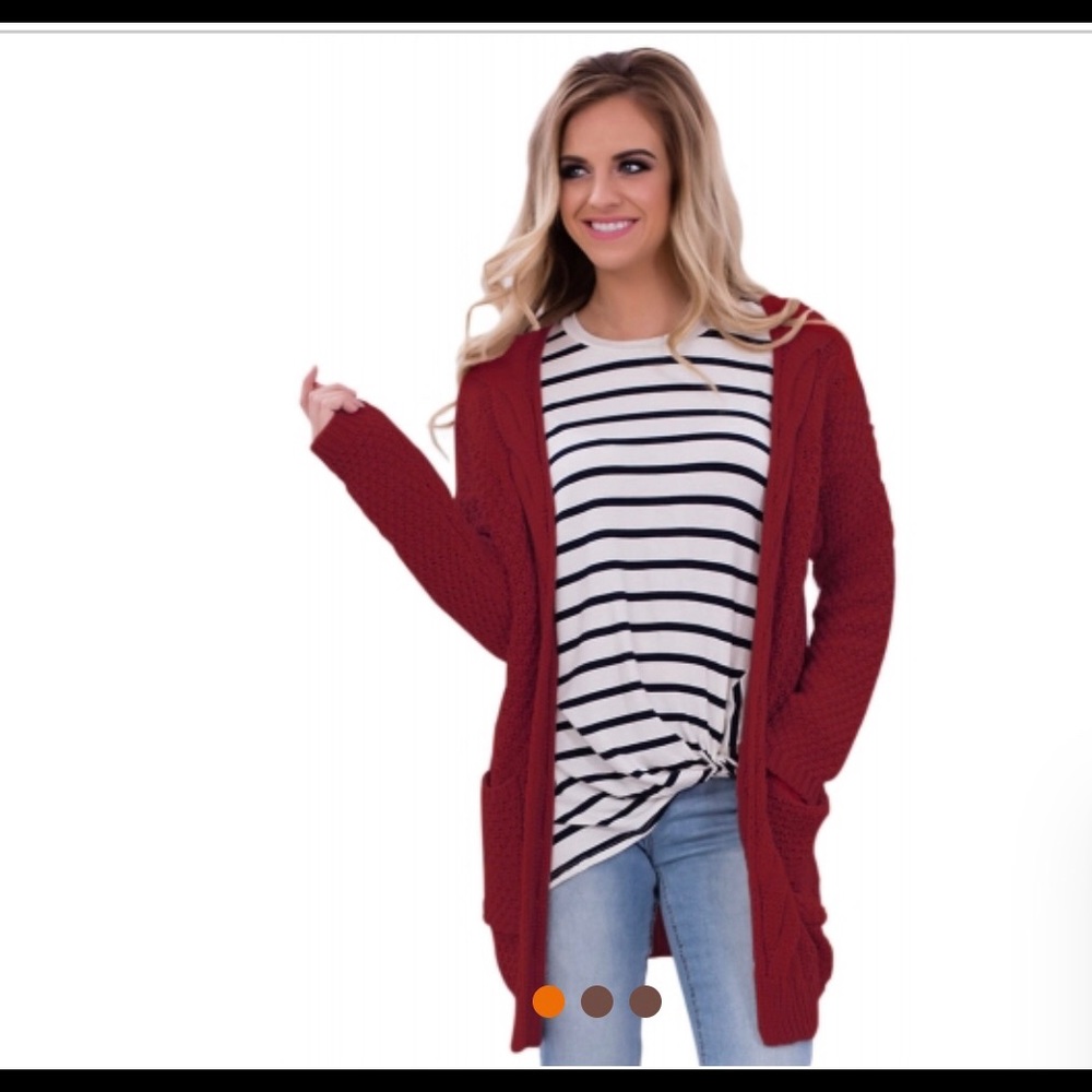 Brand new... Red sweater cardigan.. size med.